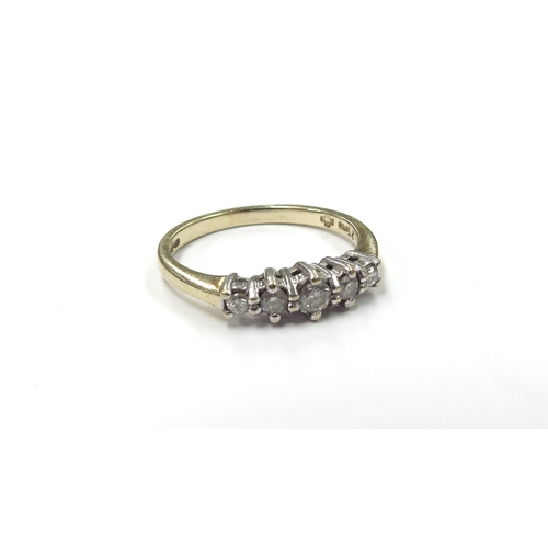 6275 - A 9ct gold graduated five stone diamond ring. Size N, 2.2g