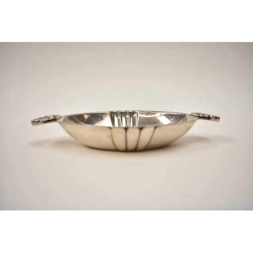 8063 - A Louis Simpson Ltd silver scallop handled bowl/dish, London 1946 Rd 847541, 2.5cm x 17.5cm long, 13... 