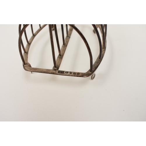 8065 - A George III silver Seven bar toast rack London 1811 maker WT, 14cm tall, 14cm long, 148g