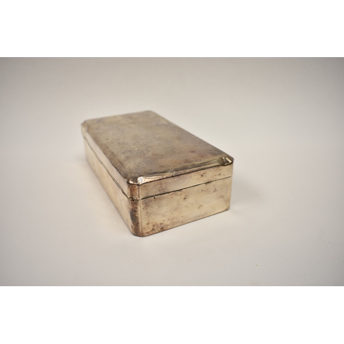 8074 - An Adie brothers ltd silver cigarette box, the front decorated with Victorian coins, dents present t... 