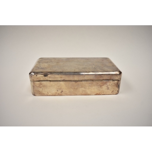 8074 - An Adie brothers ltd silver cigarette box, the front decorated with Victorian coins, dents present t... 