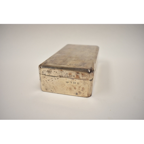 8074 - An Adie brothers ltd silver cigarette box, the front decorated with Victorian coins, dents present t... 