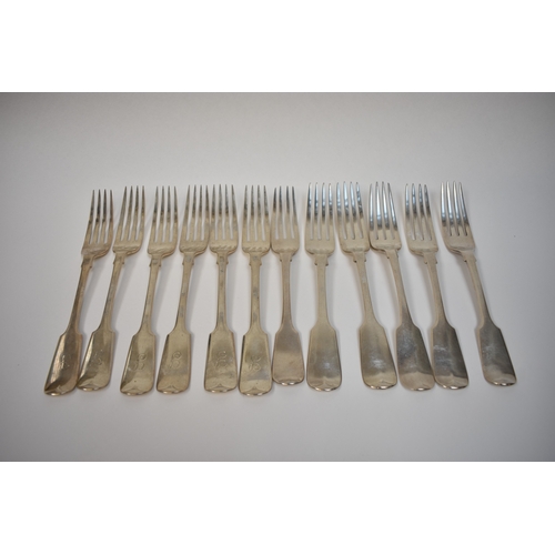 8151 - Twelve silver fiddle pattern forks, six by Josiah Williams & Co London 1902 with monogram to handle,... 