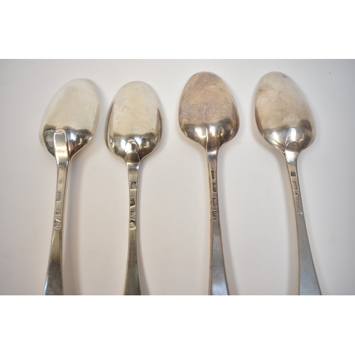 8153 - Four 18th Century London silver spoons including Ebenezer Coker, Starling Wilford all with initialle... 