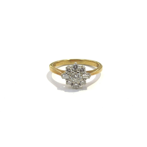 6276 - An 18ct gold diamond cluster ring with round and baguette cut diamonds. Size K, 2.8g