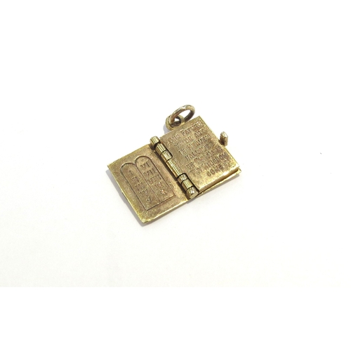 6373 - A 9ct gold Bible charm, 3.6g