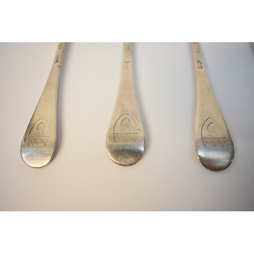 8128 - Four Britannia Standard George I rats tail silver serving spoons with Armorial crest depicting a shi... 