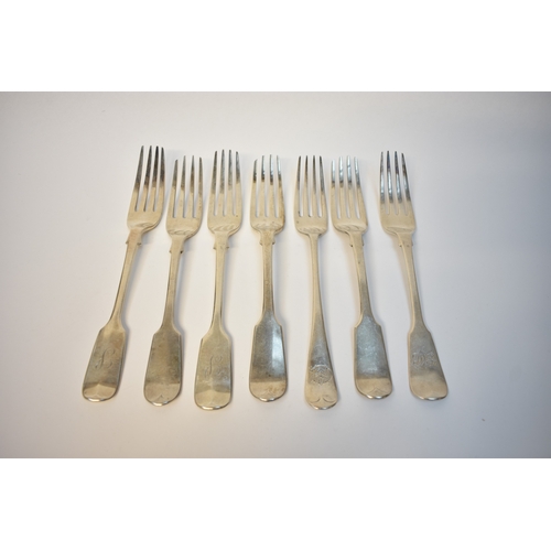 8122 - Seven silver forks all with monogram to handles various makers and dates, mostly London Hallmarked, ... 