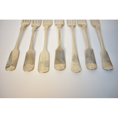 8122 - Seven silver forks all with monogram to handles various makers and dates, mostly London Hallmarked, ... 