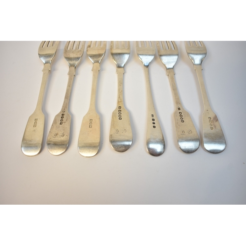 8122 - Seven silver forks all with monogram to handles various makers and dates, mostly London Hallmarked, ... 