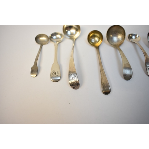 8129 - Eight Silver condiment spoons and ladles including mustard, mostly 19th Century, 93g