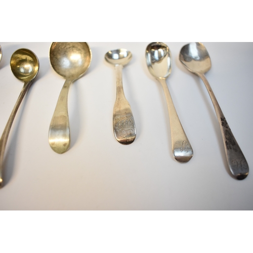 8129 - Eight Silver condiment spoons and ladles including mustard, mostly 19th Century, 93g