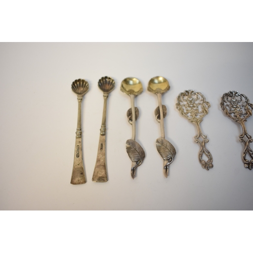 8123 - Two pairs of long handled salt spoons and pierced pair of spoons including leaf form, shell form and... 