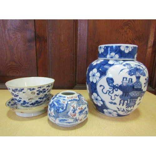 1380 - Three pieces of 19th Century Oriental blue and white ceramics including ginger jar and cover, tea bo... 