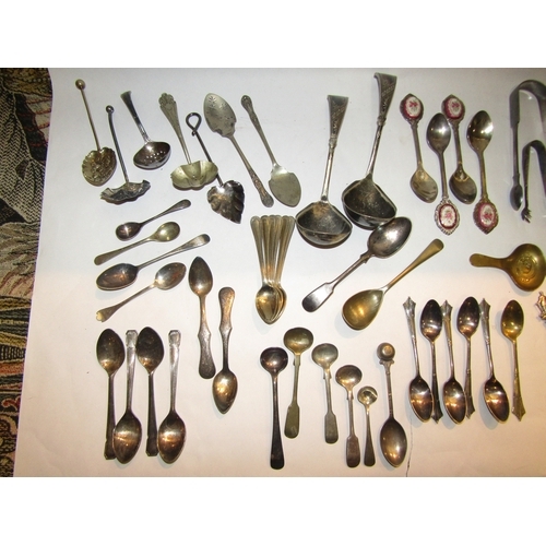 4247 - A quantity of silver teaspoons and a silver table spoon