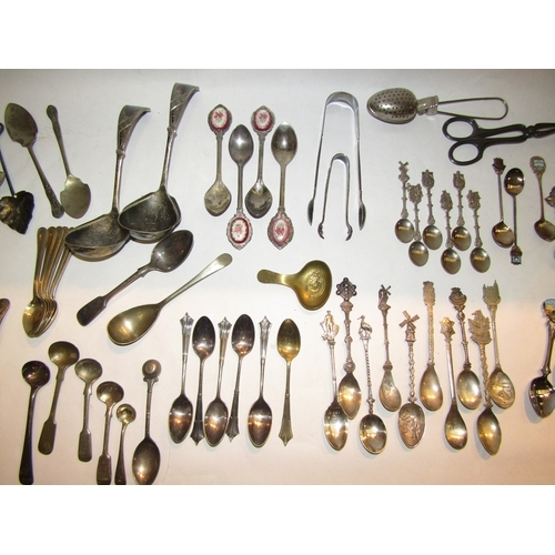 4247 - A quantity of silver teaspoons and a silver table spoon