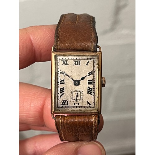 5105 - An Art Deco 9ct gold gentleman's wristwatch of curved rectangular form, Roman dial with subsidiary s... 