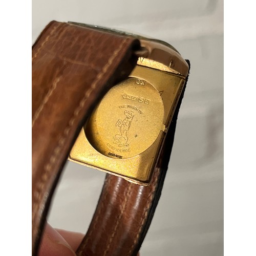 5105 - An Art Deco 9ct gold gentleman's wristwatch of curved rectangular form, Roman dial with subsidiary s... 