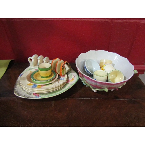 4186 - A selection of ceramics including Oriental floral design bowl and Clarice Cliff toast rack, saucer e... 