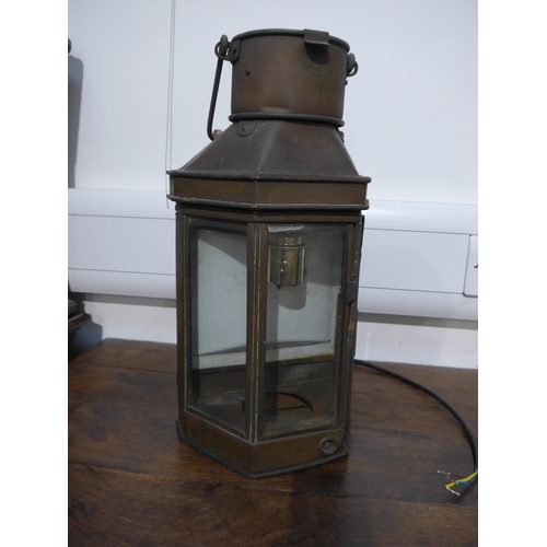 8491 - A Vintage copper wall lantern with modern electrics to interior, 41cm tall x 21.5cm wide