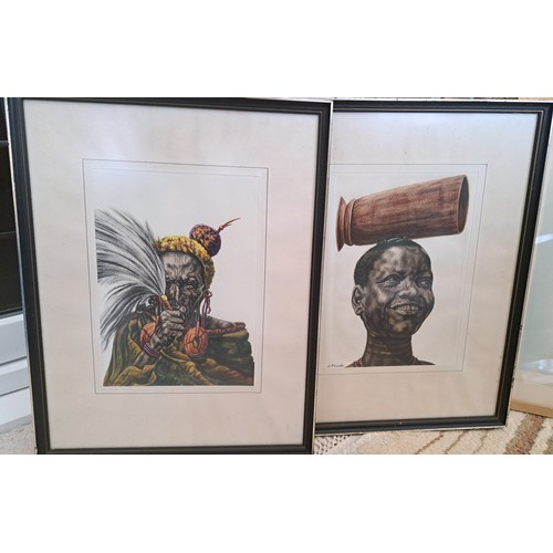 1084 - J.P. LUDU (Ugandan 1925-1965): Two framed and glazed watercolours of African tribesman. Both signed.... 