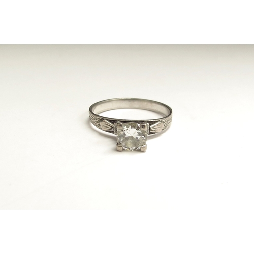 6157 - A diamond solitaire ring 0.75ct approx in unmarked white metal shank. Size P/Q, 3.2g