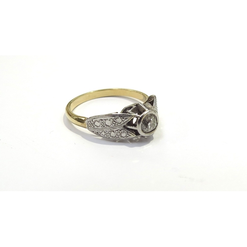 6093 - An unmarked gold, platinum set diamond solitaire ring in rubover setting, 0.20ct approx engraved pla... 