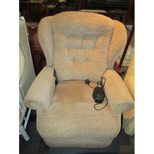 1113 - A Sherborne oatmeal upholstered button back armchair electric operated reclining chair