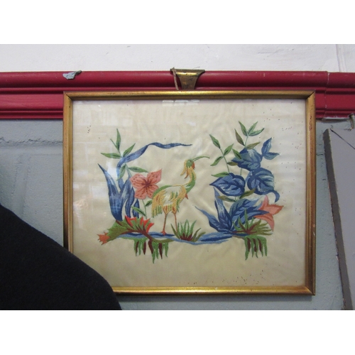 1065 - A late 19th Century needlework of an exotic bird, label of Atelier Camille Merlot verso, 20cm x 25cm... 