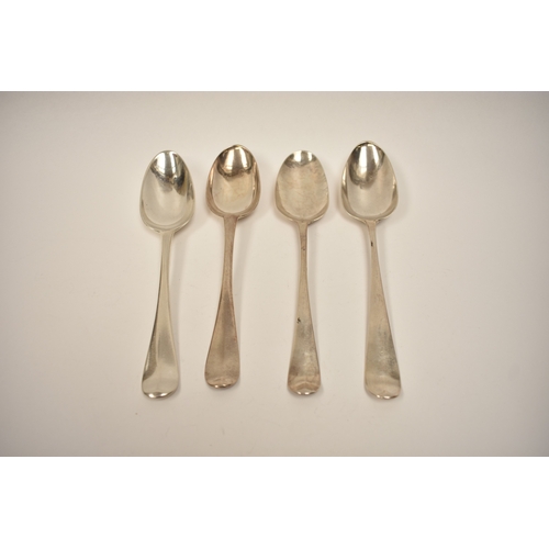 8134 - Four 18th Century silver Hanoverian spoons including fancy back and extended drop, one monogrammed w... 