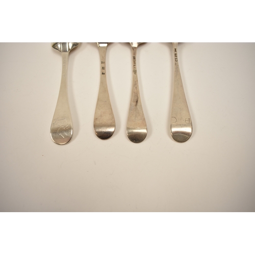 8134 - Four 18th Century silver Hanoverian spoons including fancy back and extended drop, one monogrammed w... 