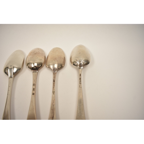 8134 - Four 18th Century silver Hanoverian spoons including fancy back and extended drop, one monogrammed w... 