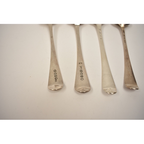 8133 - Four George III London silver Old English pattern spoons, three with bright cut detail, the other wi... 