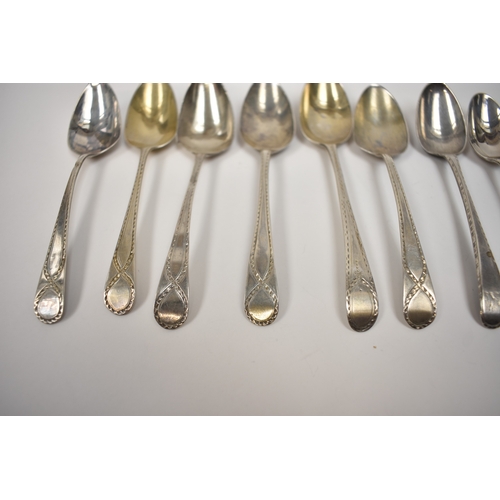 8142 - Ten silver teaspoons all with bright cut detail, including five by Thomas Evans, London 1784, 116g