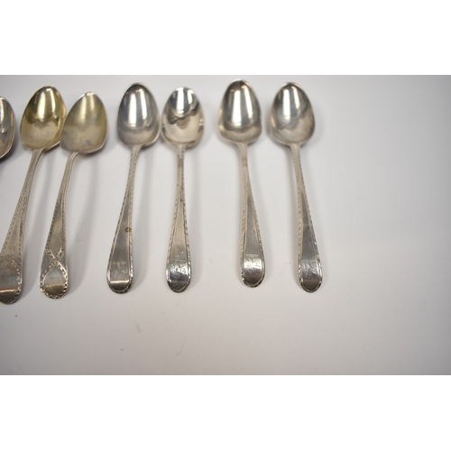 8142 - Ten silver teaspoons all with bright cut detail, including five by Thomas Evans, London 1784, 116g