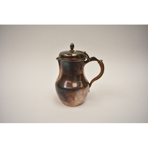 8101 - A French silver lidded milk jug with wicker wrapped handle, 12cm tall, 156g