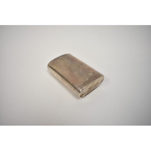 8029 - A Georgian white metal snuff box with spurious silver marks, the foliate engraved lid with central i... 