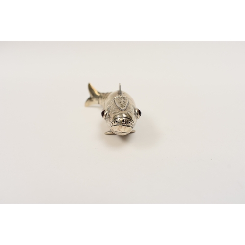 8026 - A silver articulated fish spice box, ruby coloured eyes, stamped 830S, with hinged perforated head, ... 