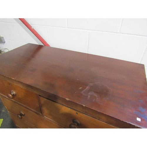 1010 - A 19th Century mahogany chest of two short over three long drawers with bun handles, a/f, 120cm tall... 