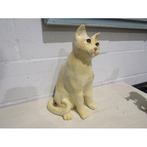 1030 - A large Winstanley seated cat with blue glass eyes, size 8, 40cm tall