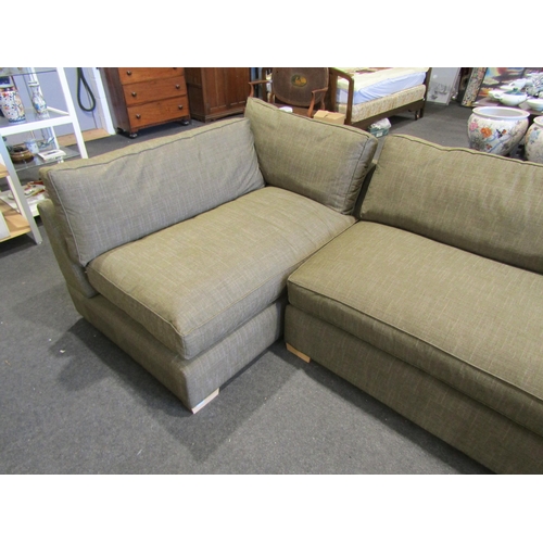 1107 - An olive green upholstered 