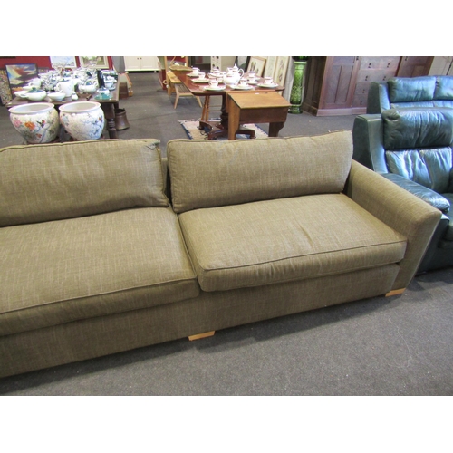 1107 - An olive green upholstered 