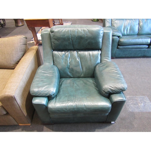 1108 - An emerald green leather two seater sofa and matching armchair