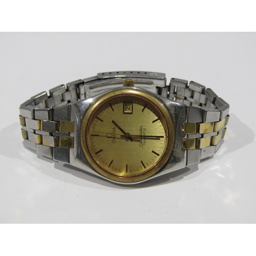 1237 - An Omega Seamaster steel cased quartz wristwatch with gilt baton marker dial having date aperture an... 