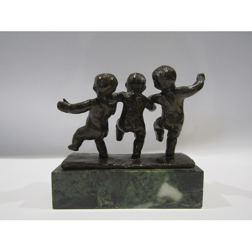 1136 - A bronze figural group of three children, granite plinth, a/f crack to arm of central figure, 14cm h... 