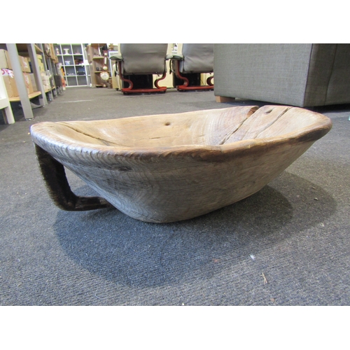 1155 - A carved wooden grain scoop bowl, single handle to underside, 47cm x 37cm