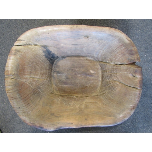 1155 - A carved wooden grain scoop bowl, single handle to underside, 47cm x 37cm