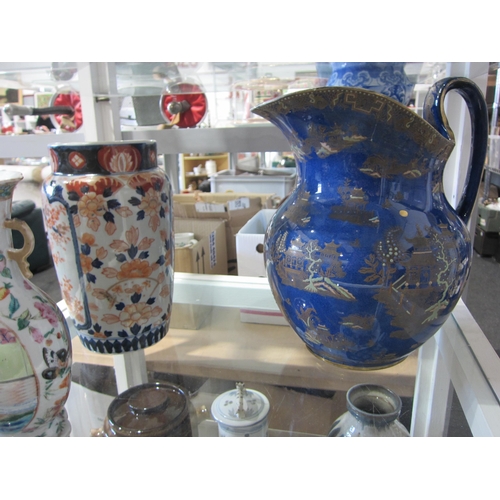 1404 - A pair of Chinese Famille Rose bulbous form vases with another and a Carlton Ware Kang Hsi large jug... 