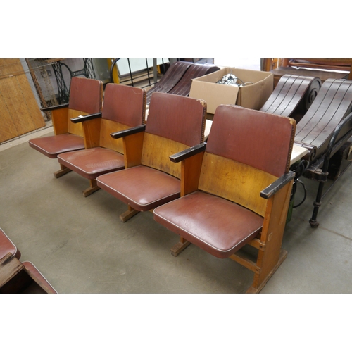 2018 - A wooden framed row of folding cinema seats, W202cm