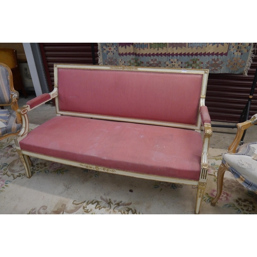 2333 - A cream and gilt painted sofa, upholstery a/f